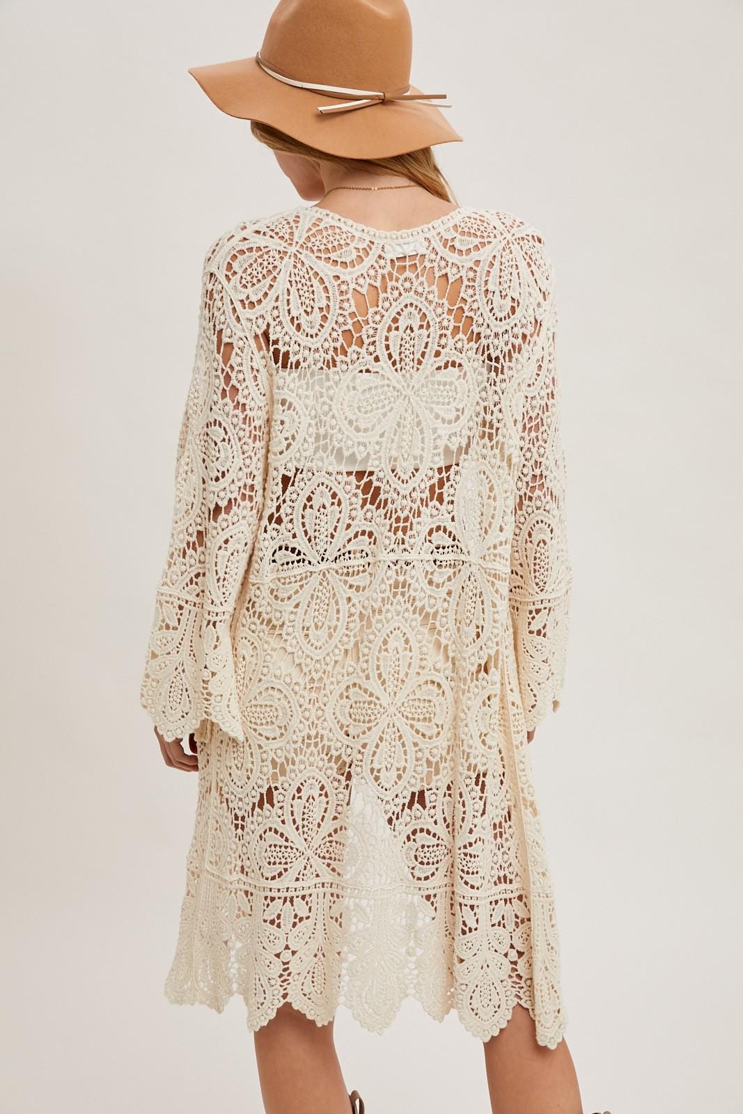 Full-length coastal cowgirl look featuring an ivory floral crochet layer with a scalloped hem