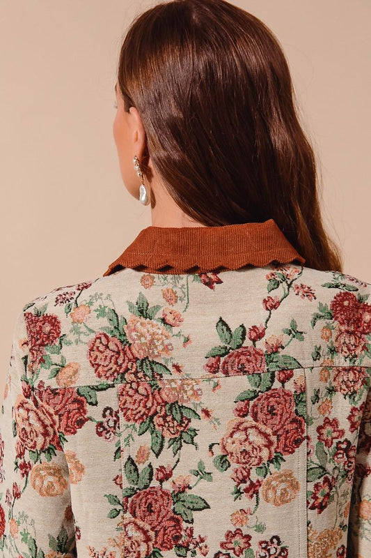 Back of the Cottagecore tapestry coat showing the vintage-inspired rose weave in rust, sage, and cream colors.
