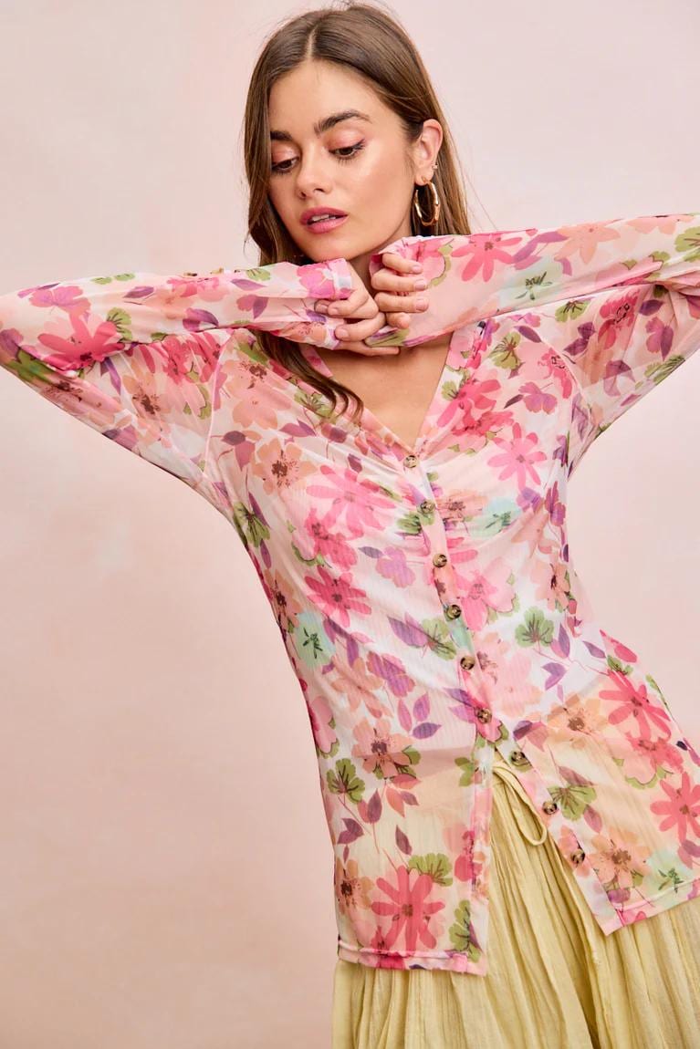 Fairycore pink floral mesh V-neck blouse with ruched button front and pointed hem in a sheer watercolor botanical print.