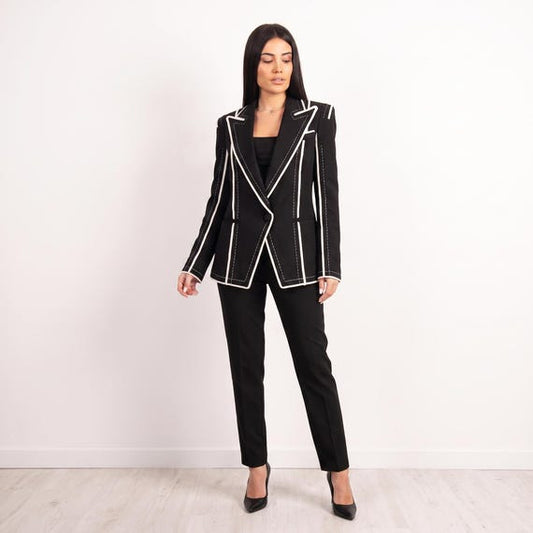 Women's black blazer with white contrast stitching, tailored silhouette