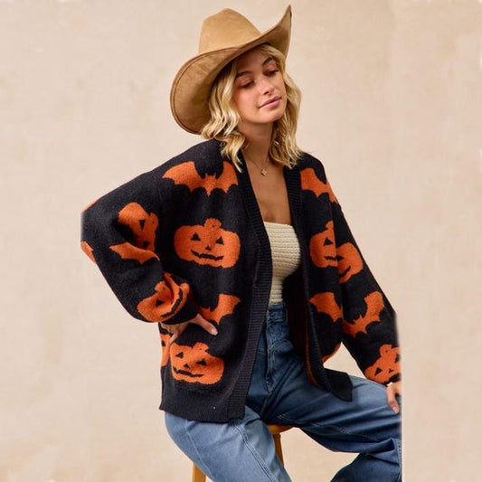 Back of relaxed fit Halloween Cardigan, showcasing full pumpkin and bat artwork on knit fabric.