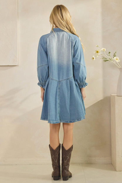 Full-length view of the cottagecore denim dress with a raw hem and gathered long sleeves for a boho look