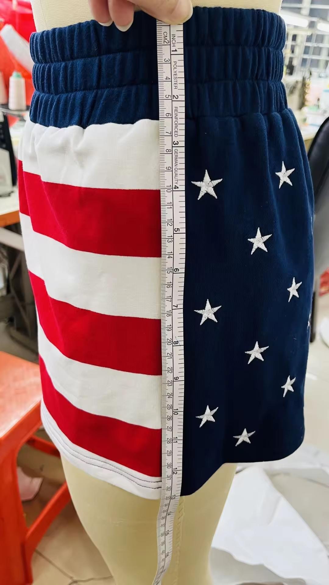 Flat lay of retro sportswear American Flag French Terry Shorts designed for relaxed summer lounging.