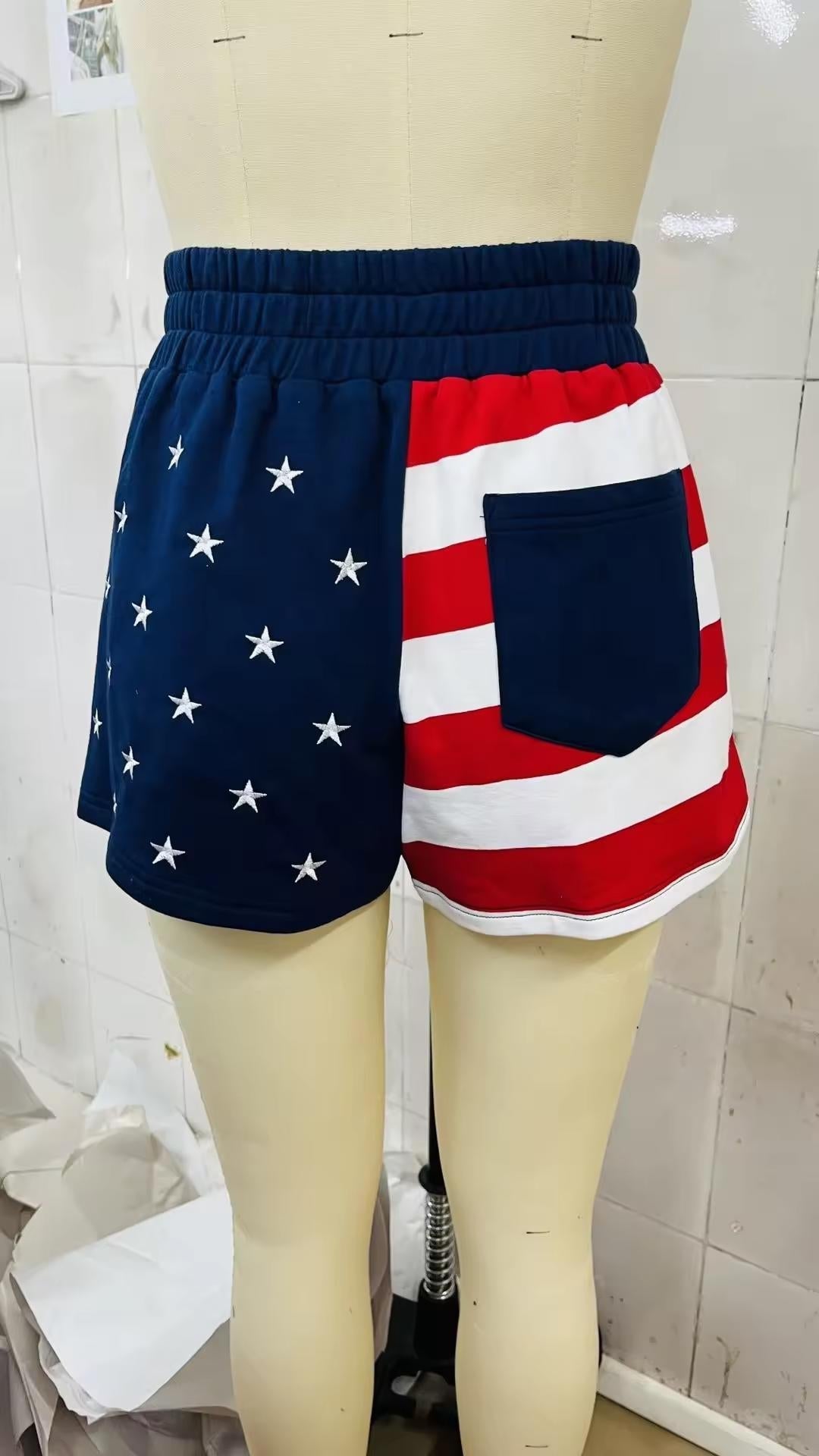 Zoomed-in texture of the soft French terry material on these durable embroidered star patriotic shorts.