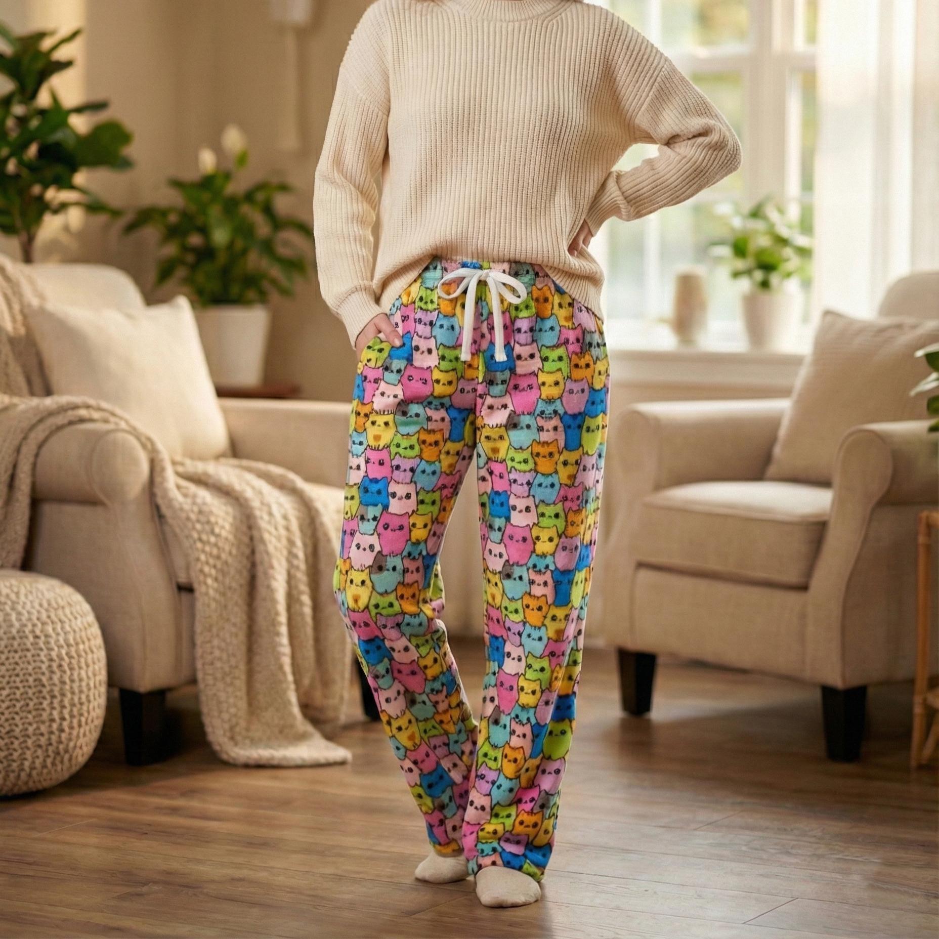 Close-up of the soft bunny-fleece texture on these whimsical Kawaii cat pattern pajama pants.