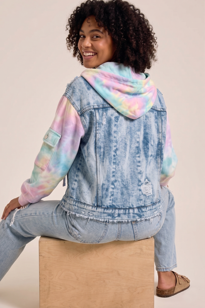 Rear view of a distressed light blue denim hoodie jacket featuring pastel tie-dye sleeves and raw, frayed edges. (Back view of a distressed light blue denim hoodie jacket featuring pastel tie-dye sleeves and a frayed raw hem.)
