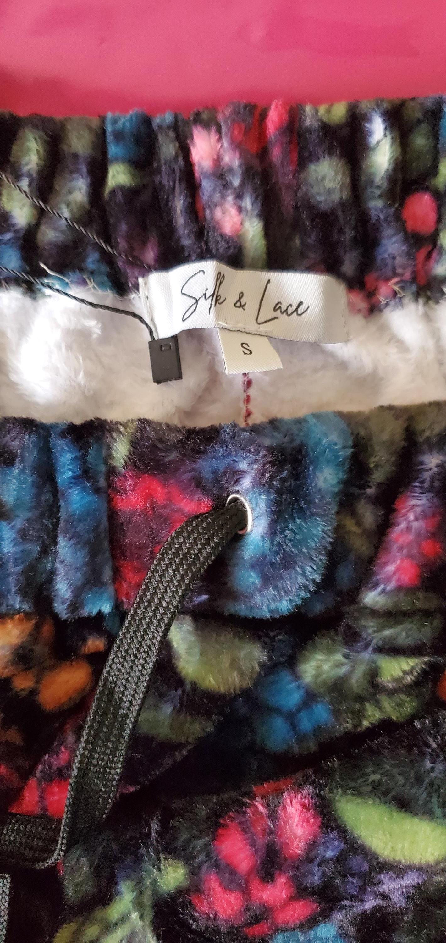 Close-up of the 30-inch inseam hem on tall botanical fleece joggers, perfect for extra leg length