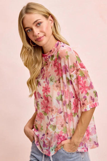 Model wearing the Fairycore style sheer top paired with a camisole for a dreamy festival look