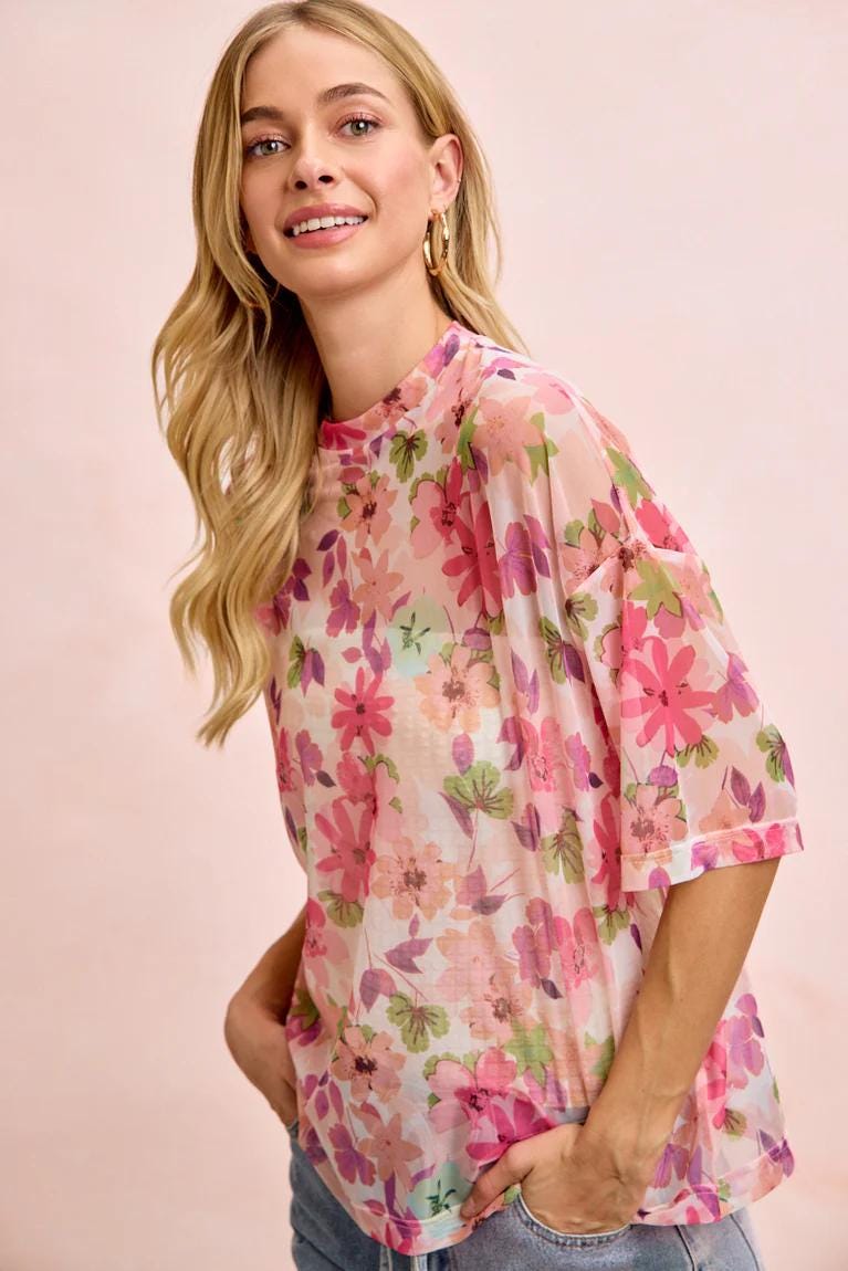 Y2K aesthetic outfit featuring the sheer floral tee layered over a basic tank for a Coquette vibe