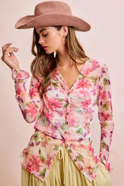 Front view of the Fairycore floral mesh blouse with ruched detailing and a pointed hemline in pink