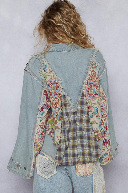 Back of the oversized Boho-chic jacket showing intricate floral panels and a relaxed silhouette