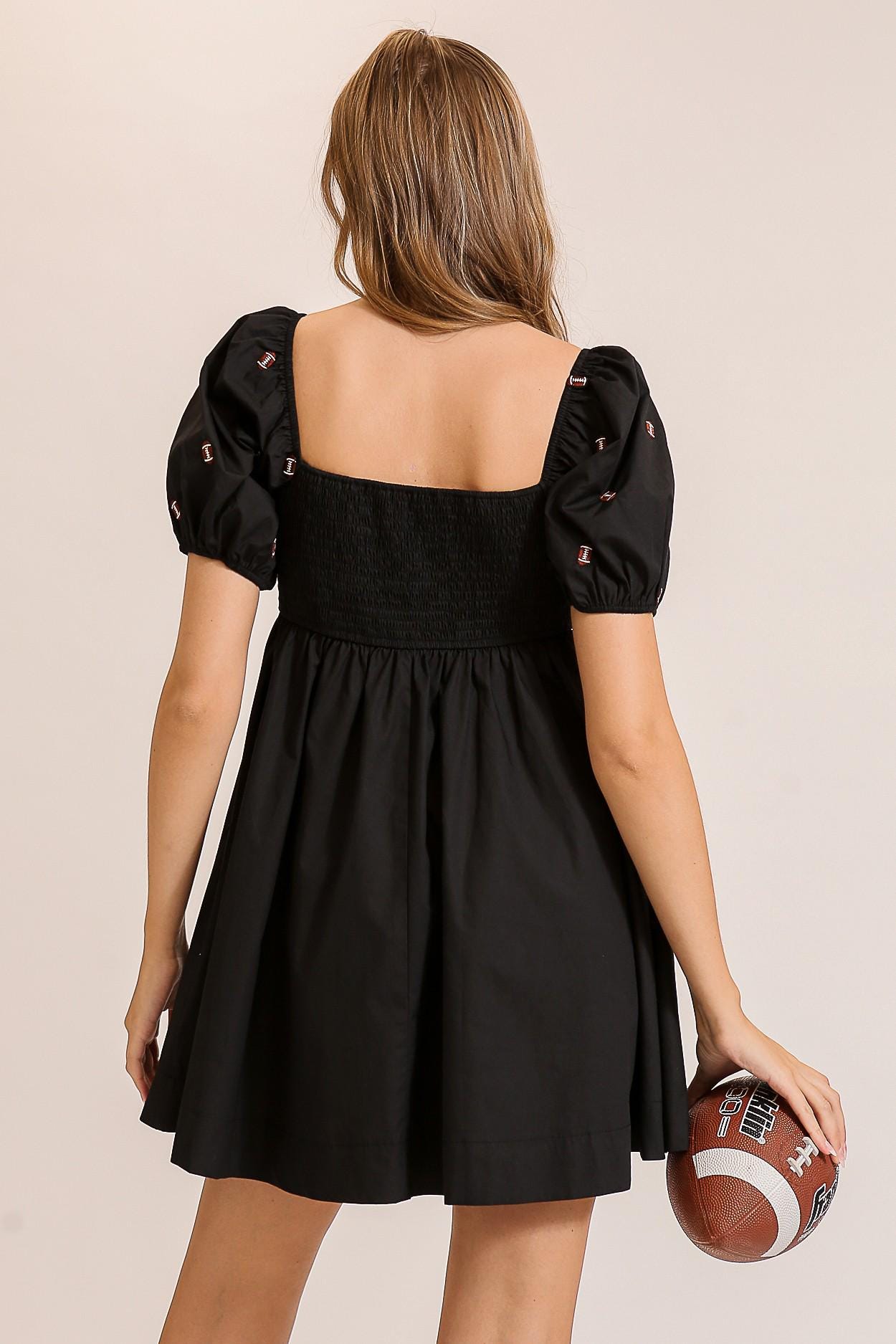 A stylish gameday glam look featuring the football print mini dress for trendy tailgate fashion