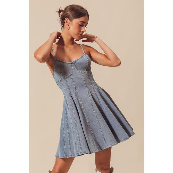 Y2K denim aesthetic dress styled with accessories, highlighting the flattering corset waist
