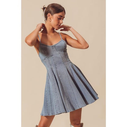 Y2K denim aesthetic dress styled with accessories, highlighting the flattering corset waist