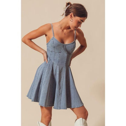 Detailed view of the adjustable spaghetti straps and sweetheart bustier top on the denim dress