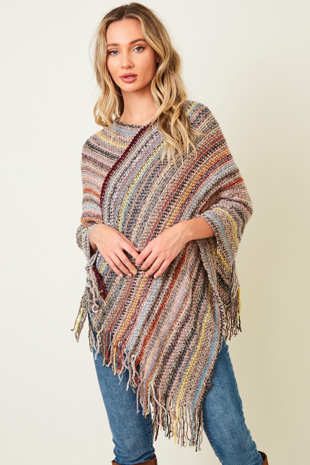 Back view of the asymmetrical space-dye wrap showing the fluid drape and earth-toned bohemian aesthetic.