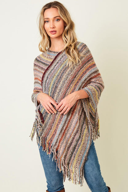 Back view of the asymmetrical space-dye wrap showing the fluid drape and earth-toned bohemian aesthetic.