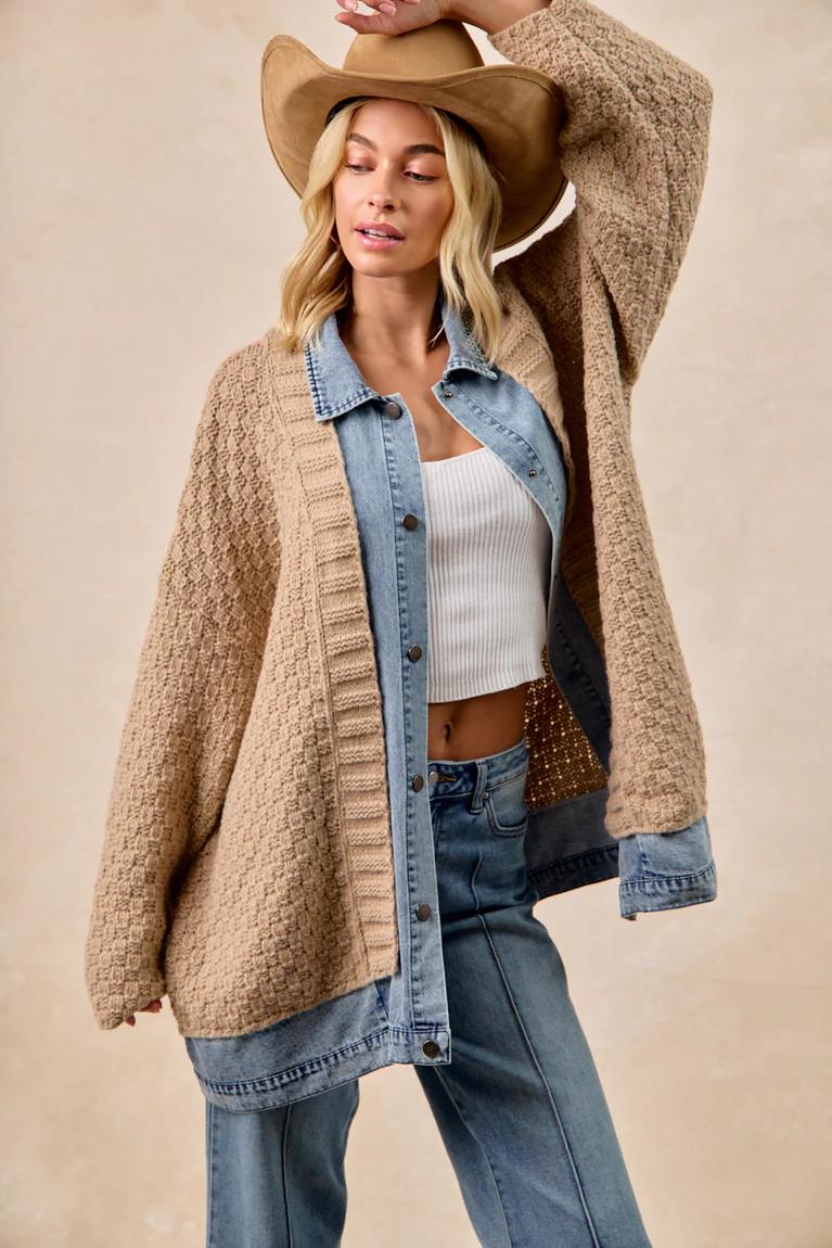 Model wearing the oversized coastal cowgirl top paired with high-waisted jeans for a rustic look