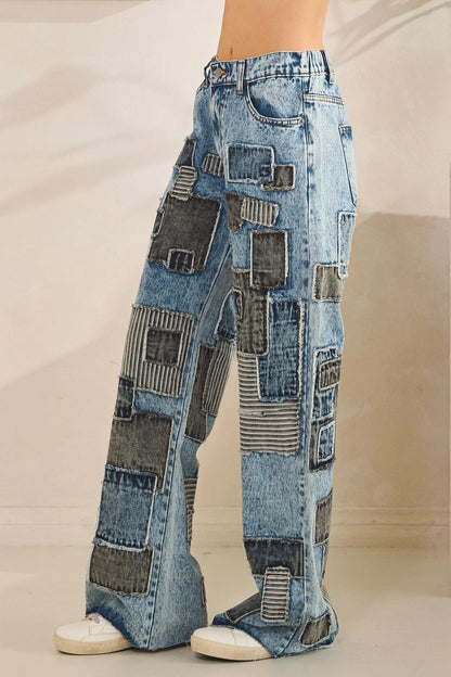 Lifestyle shot of 90s revival patchwork denim pants in motion for a grunge-chic aesthetic