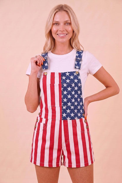 Front view of patriotic stars and stripes cotton blend shortalls with a classic bib pocket and adjustable straps