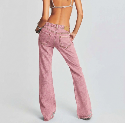 Back of pink wide-leg denim pants showing the Y2K flare fit and shimmering crystal details on the pockets