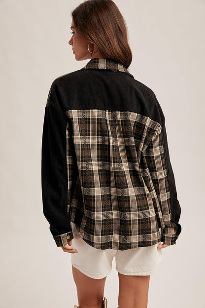 Close-up of black corduroy panels and metallic gold hardware on the breathable 100% cotton fabric.