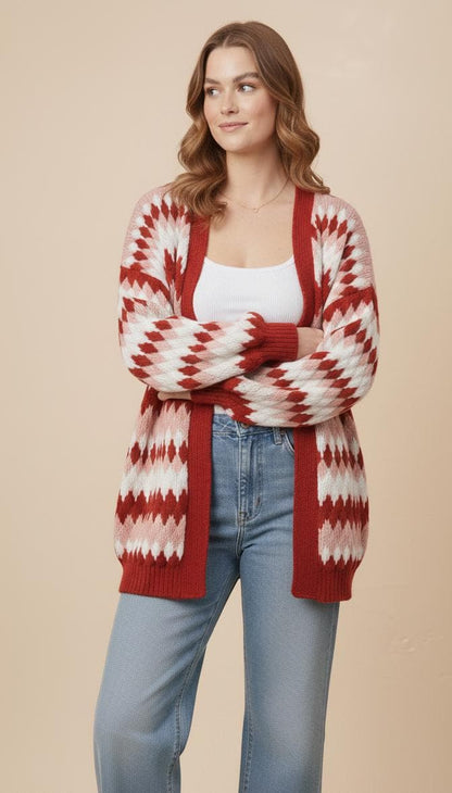 Close-up texture of the chunky diamond knit acrylic yarn in bold dopamine dressing colors like pink and red