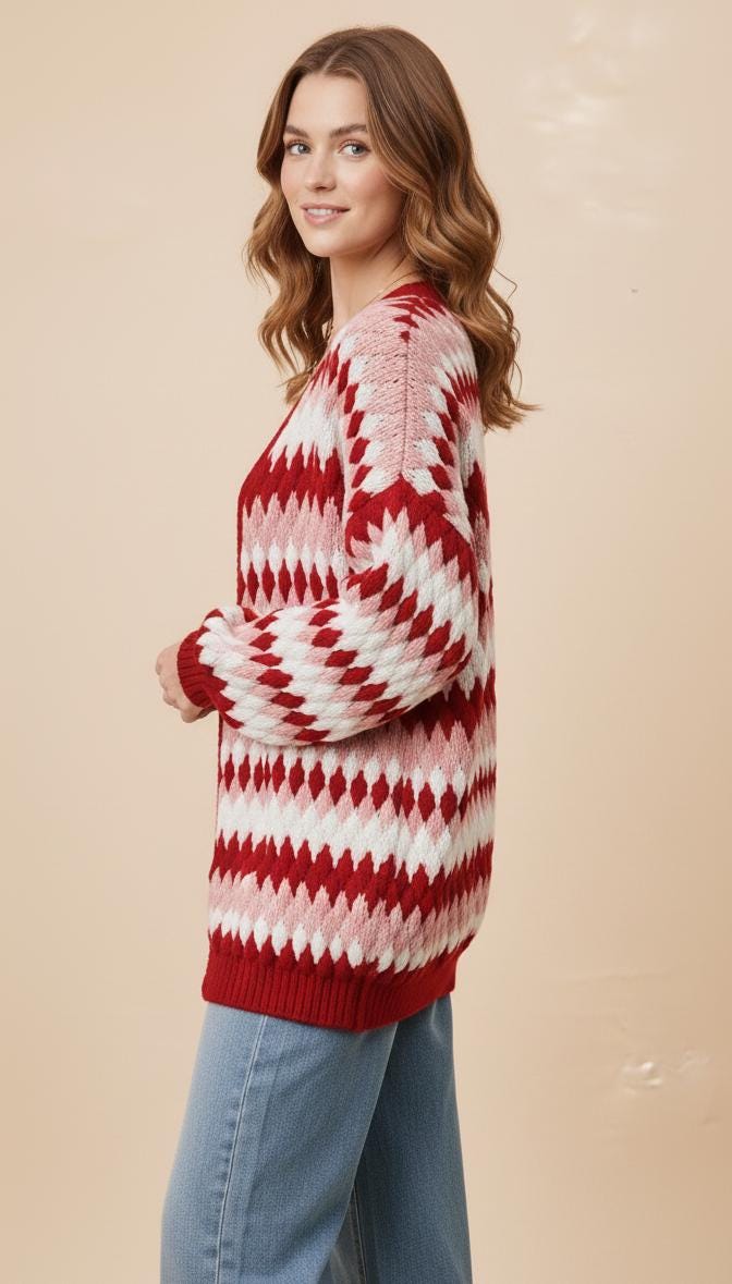 Side angle of the Whimsigoth aesthetic diamond knit sweater showcasing the thick ribbed cuffs and vibrant tones