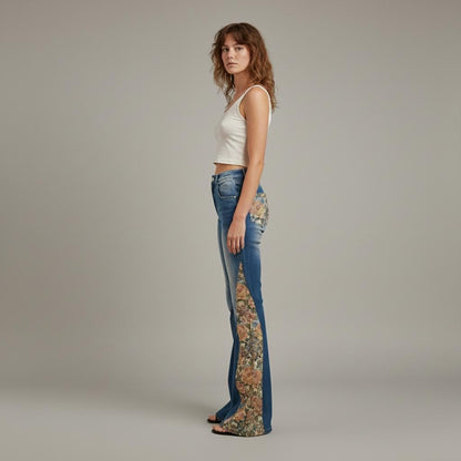 Profile view of tall girl aesthetic jeans with floral tapestry contrast and wide leg opening.