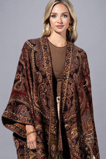 Close-up of the soft-touch wool fabric and dramatic fringe on this Whimsigoth paisley shawl