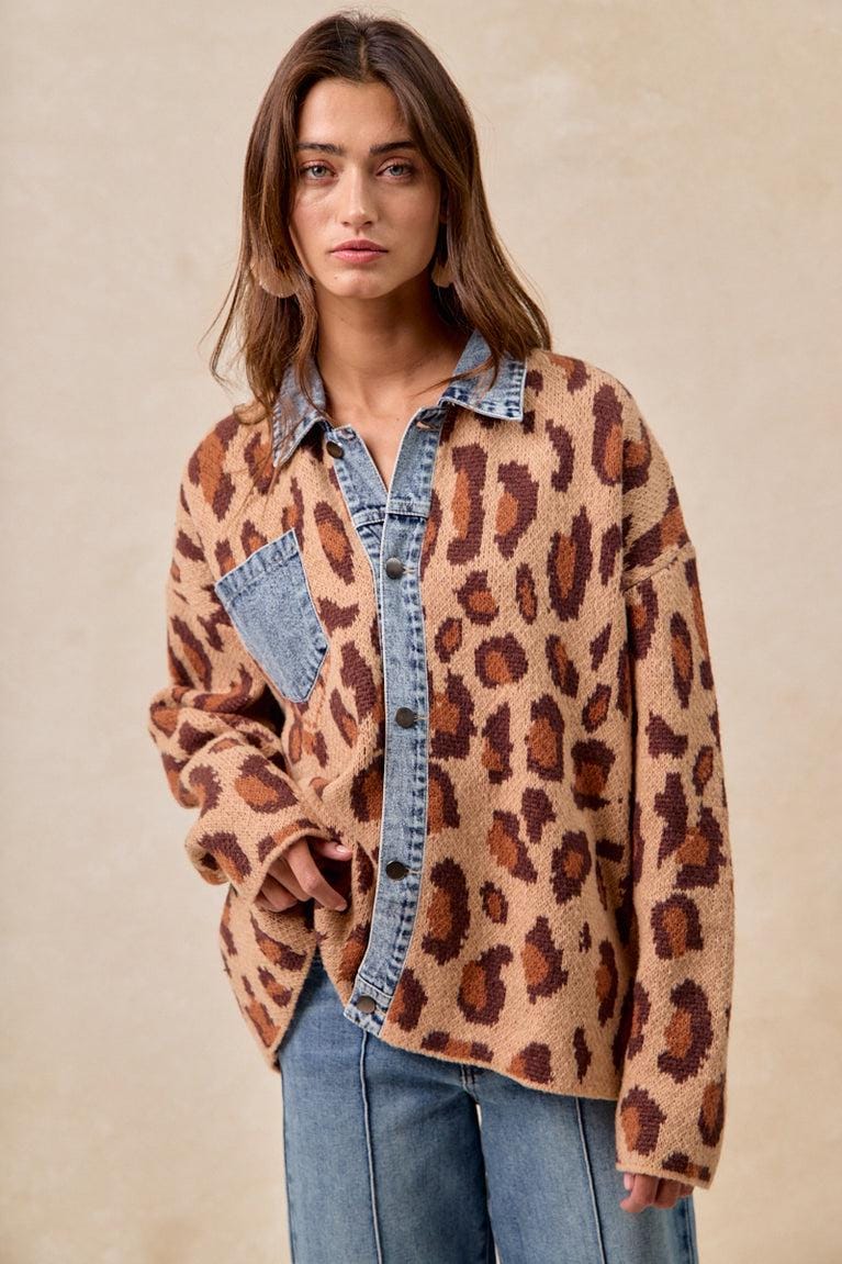 Angled view of the eclectic indie sleaze jacket highlighting the contrast between denim and leopard.