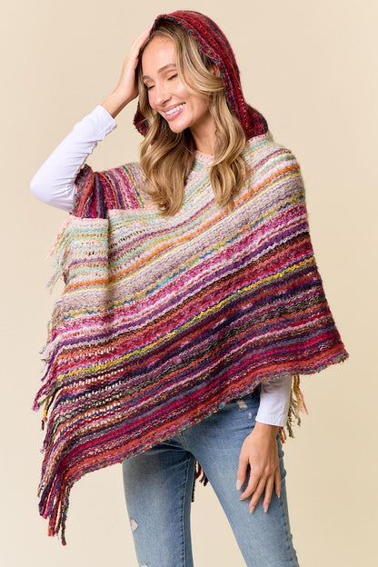 Detail of the cozy hood on the multicolor striped boho wrap, perfect for hippie aesthetics