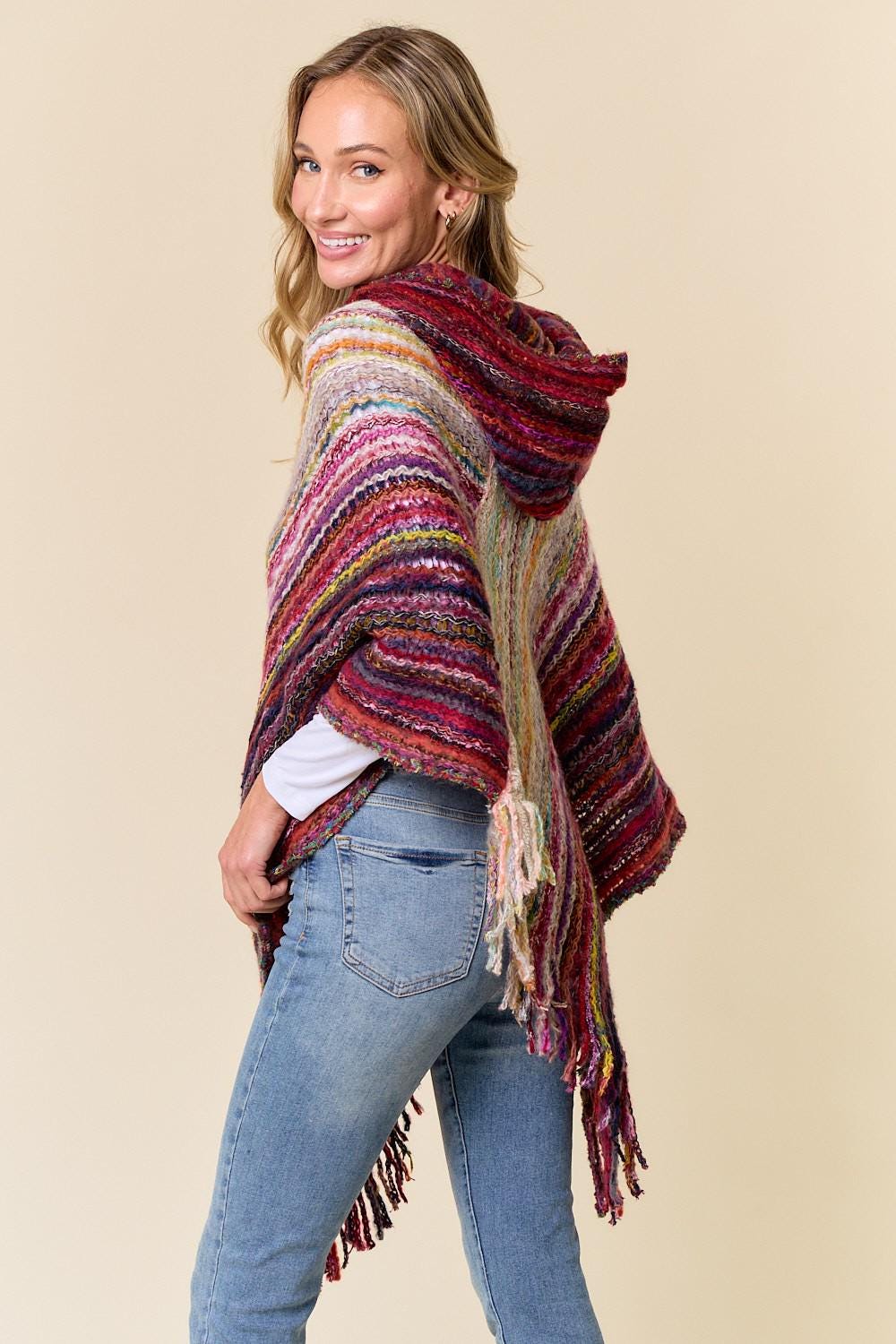 Full-length view of the cottagecore inspired poncho styled with western gothic elements
