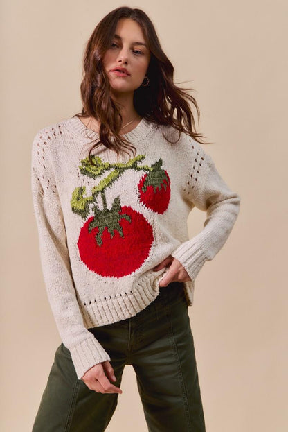 Front view of the Tomato Graphic Sweater in cream cotton blend with pointelle knit accents