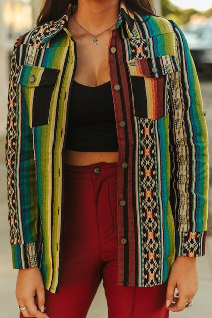 Back view of the polyester roll-tab southwestern shirt showcasing a relaxed silhouette and geometric patterns