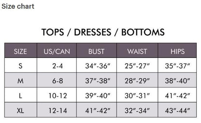 Detail shot of the high-quality garment construction and delicate lace inserts on the shoulder.