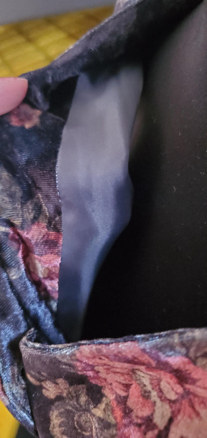Three-quarter back view of the bohemian goth vest emphasizing the crushed velvet texture and fit