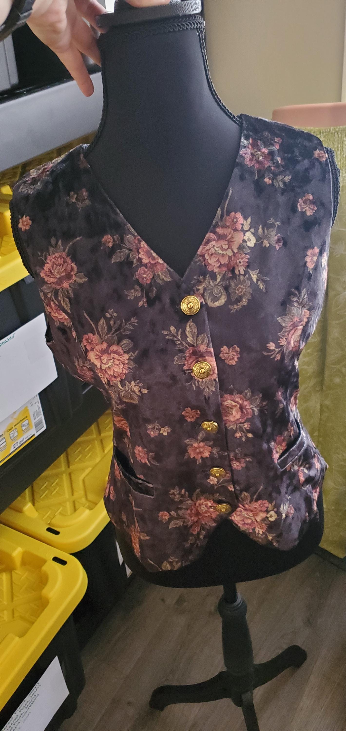 Close-up of the pocket detail on the floral tapestry vest, perfect for a witchy aesthetic top