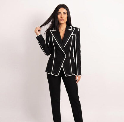 Detail of peaked lapel on tailored 'Old Money' style black blazer