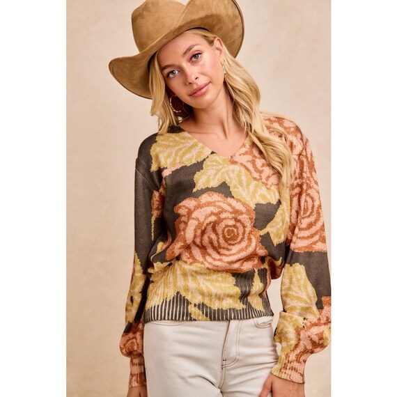 Cozy lifestyle view of the boho winter blouse styled with casual denim for an earthy look