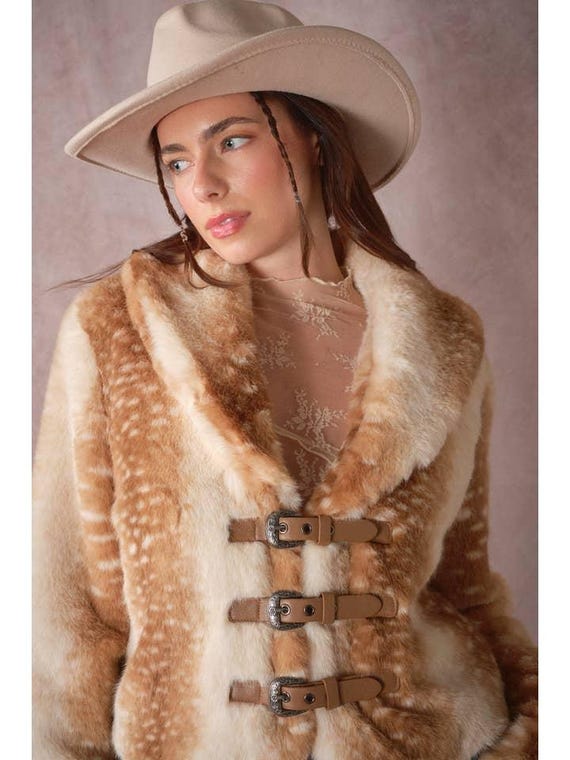 Back view of cozy faux fur jacket with deer print pattern