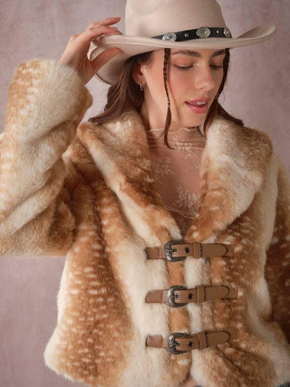 Woman wearing a statement deer print faux fur jacket in a lifestyle setting