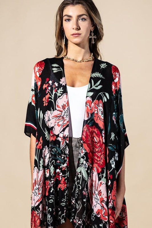 Back view of longline boho floral kimono cardigan, black viscose with dark botanical print, relaxed fit.