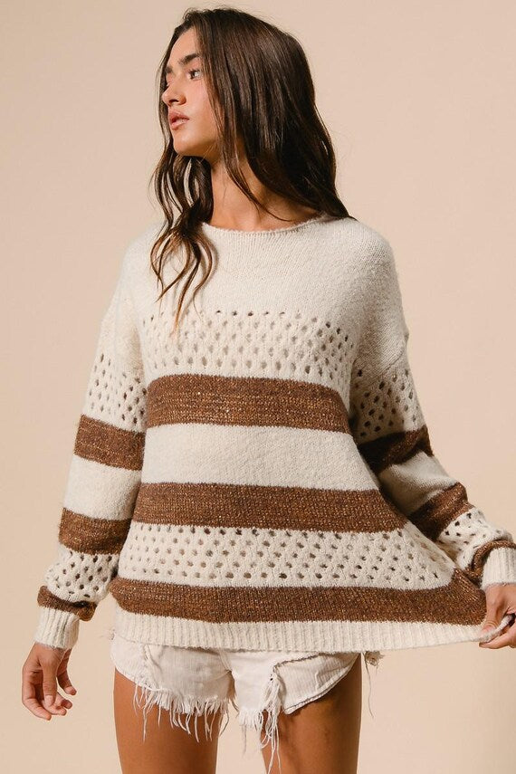 Women's boho casual relaxed-fit knit sweater in cream and brown stripes with perforated open-knit details.