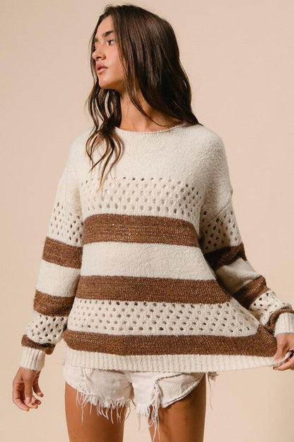 Women's boho casual relaxed-fit knit sweater in cream and brown stripes with perforated open-knit details.