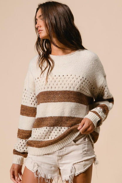 Women's boho casual cream knit sweater featuring brown horizontal stripes, a perforated pattern, and a relaxed fit.