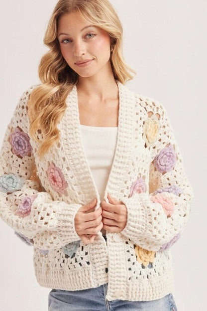 Medium weight, breathable open stitch crochet cardigan with handmade 3D floral details