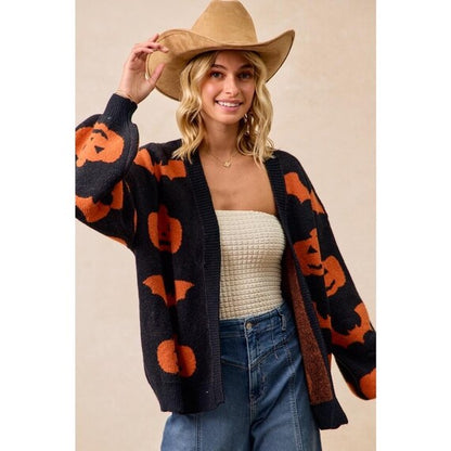 Cozy Autumn Whimsigoth Sweater, a relaxed fit orange black jacket with playful pumpkin and bat details.