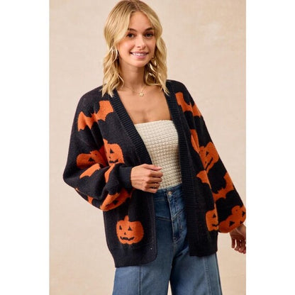 Soft acrylic polyester blend fabric detail of the Women's Pumpkin Bat Print Cardigan, ensuring warmth without bulk.