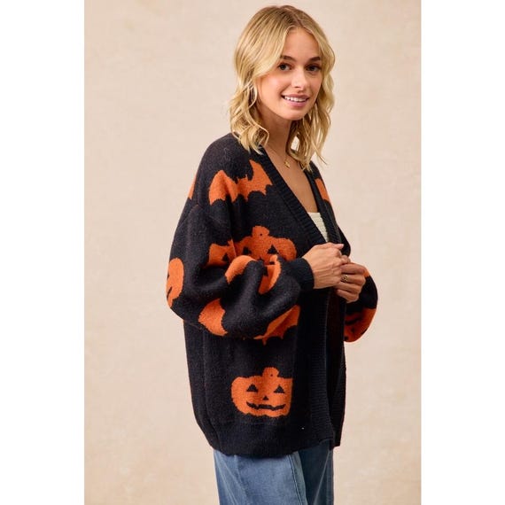 View highlighting the open front design of the Pumpkin Bat Print Cardigan, perfect for layering unique style.
